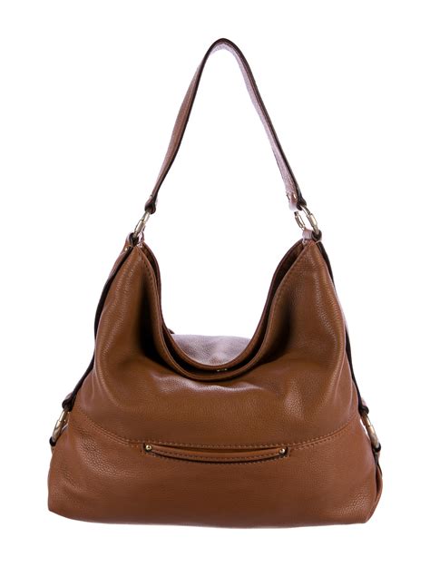 michael kors vintage hobo purse|Michael Kors tan bag.